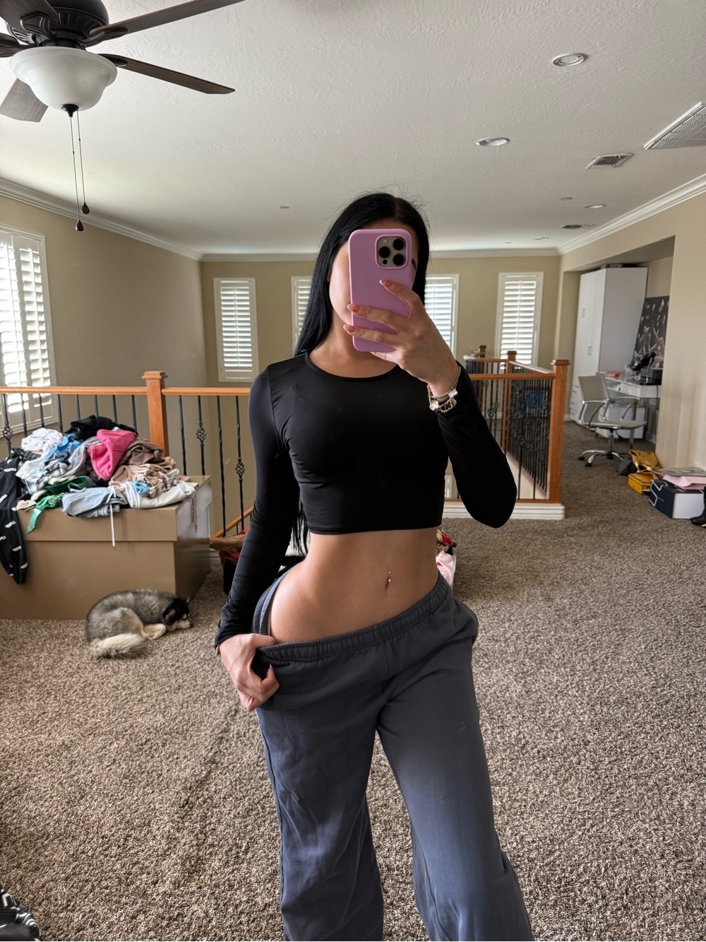 Black Long-Sleeve Cropped Top and sweats and brown jeans